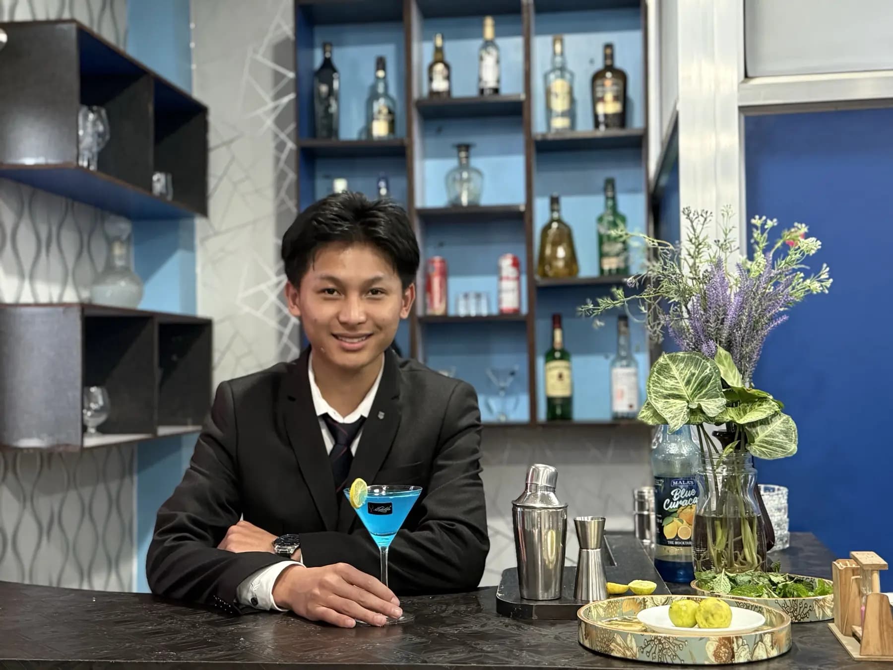 A student at the Emporium training bar