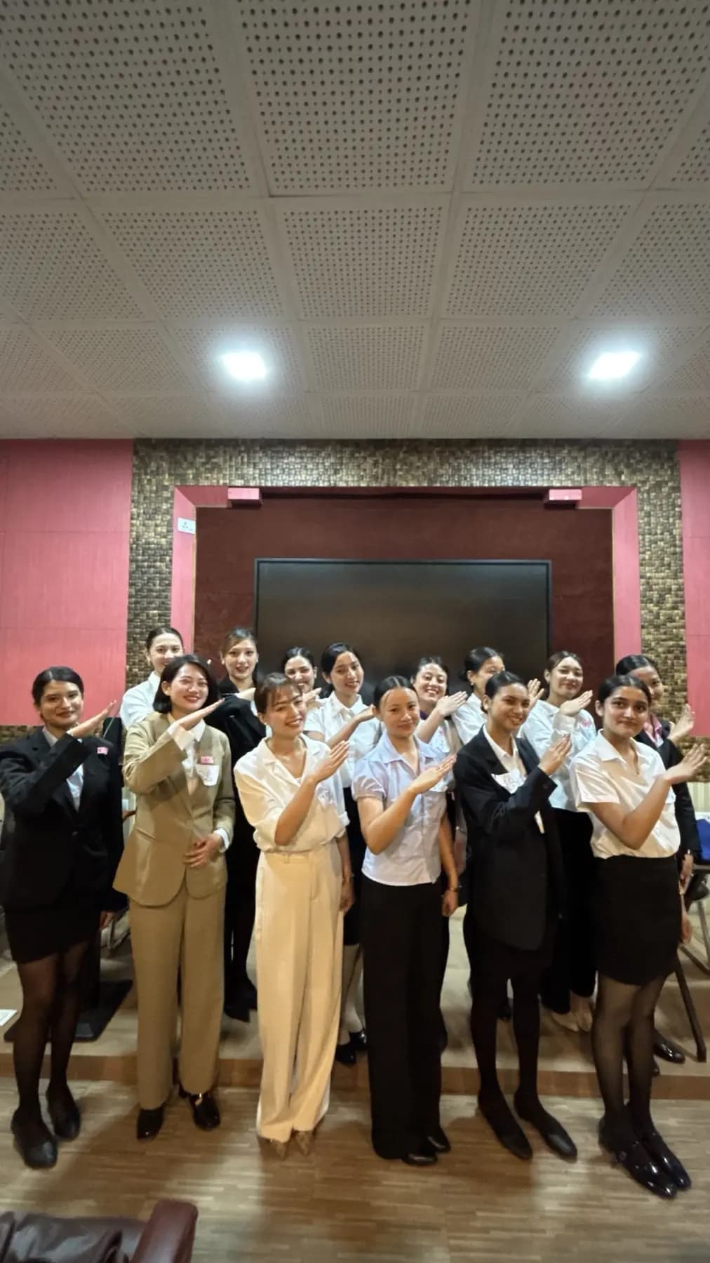 A cabin crew batch in uniform during grooming training