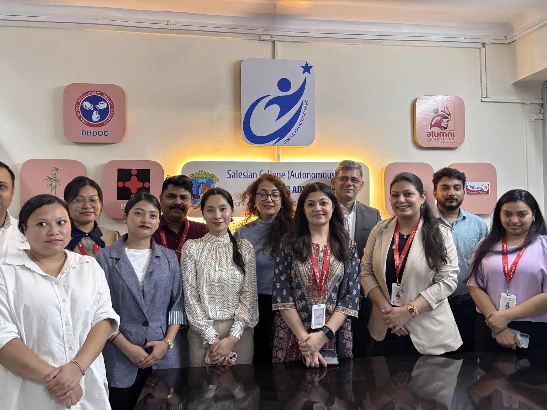 Industry professionals with students at an Emporium centre